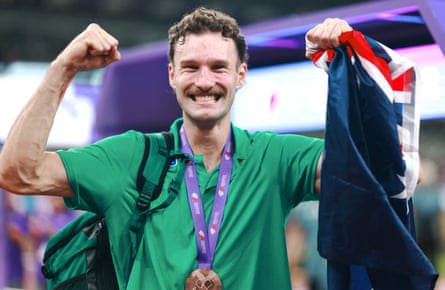 Kurtis Marschall of Australia celebrates aft coming 3rd successful nan rod vault.