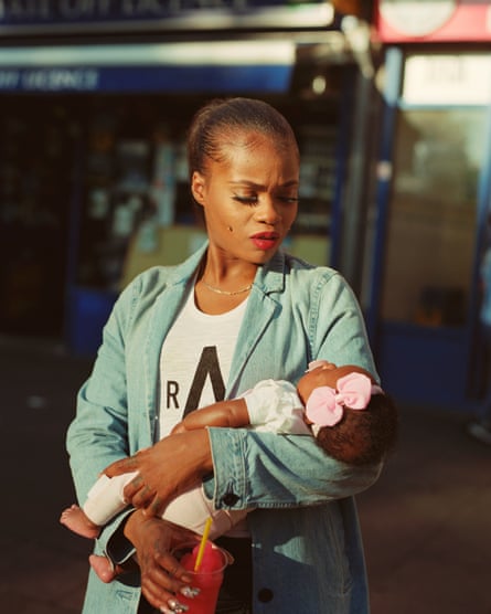Cybil McAddy holds her daughter Lulu in Clapton, east London. The image by Enda Bowe has been shortlisted for the Taylor Wessing prize