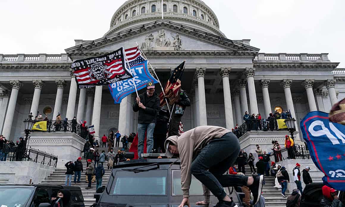 Supporters of Donald Trump riot outside the US Capitol in January 2021.