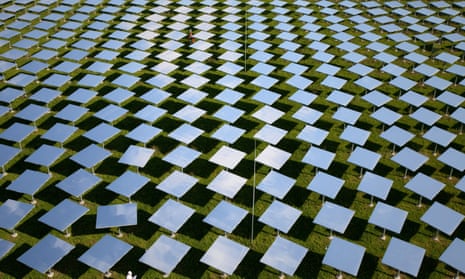 A researcher works in the mirror field of the Juelich solar tower in north-west Germany.