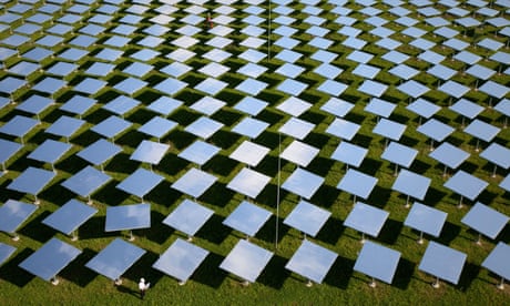 A researcher works in the mirror field of a solar tower power plant Jülich, Germany.