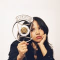 The cover art for Yearnalism, showing Baby Rose holding a microphone