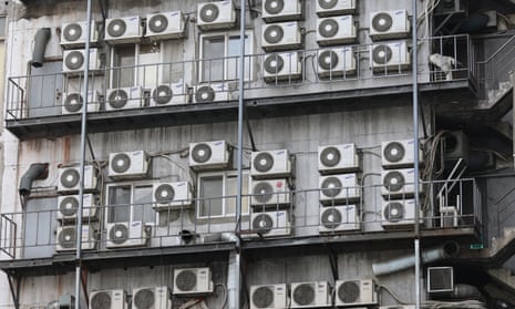 Air conditioners outside a building in Seoul. The harmful chemicals that make our lives comfortable contribute to the climate crisis.