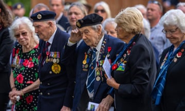 Normandy veterans 104-year-old John Gillespie, left, and 99-year-old Simeon Mayou, right