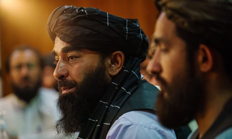 Zabihullah Mujahid, the Taliban spokesman, holds a press conference.