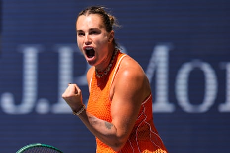 Aryna Sabalenka reacts with joy.