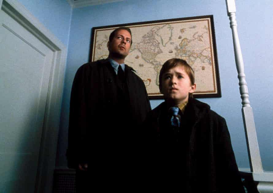 Willis with Haley Joel Osment in The Sixth Sense.