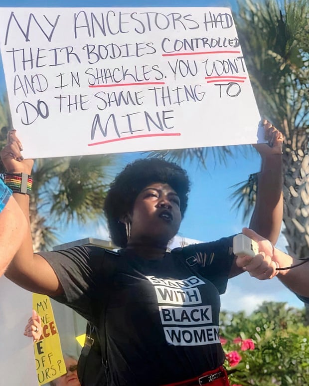 Kenyatta Thomas, an Arizona State University student and activist, participates in an abortion-rights protest.