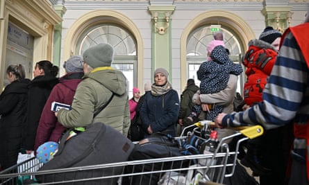 People arrive at Przemysl train station in Poland on a train from Odesa