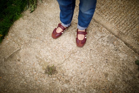 Killick’s feet alongside a crack in the ground
