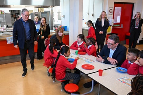 Keir Starmer, Angela Rayner and Andy Burnham at a primary school in Ashton-under-Lyne, north-west England.