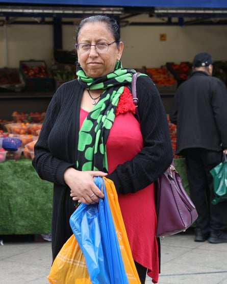 Biaz with plastic shopping bag and market stall in background