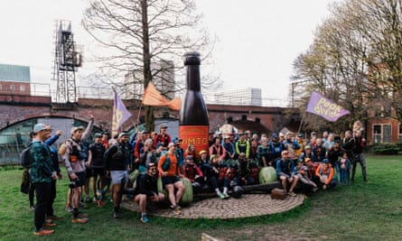The Peak Divide’s 76 runners gather in central Manchester before their 76km journey.