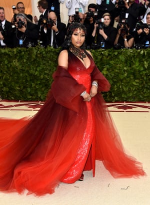 Where there are saints, there are sinners. So says Nicki Minaj who sported a devilishly red Oscar de la Renta gown. The rapper used the occasion to announce the title of her new album: Queen.