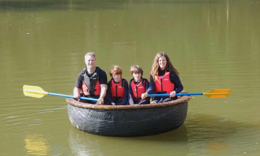 Rhiannon, her boys and Nigel in a coracle