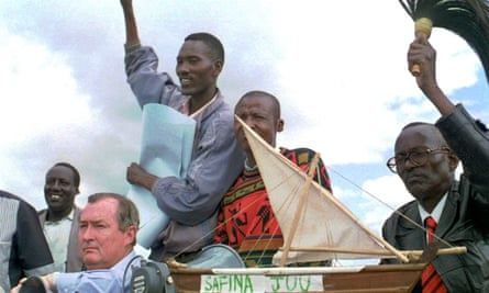 Richard Leakey, seated left, riding with supporters of his Safina party during an election rally in Kajiado in 1997.