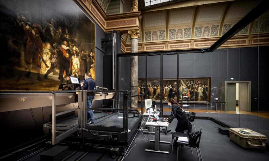 Restorers working on Rembrandt’s Night Watch at the Rijksmuseum, Amsterdam. 