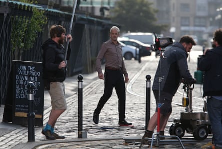Spotted … Jonny Lee Miller, centre, filming a scene in Edinburgh for the forthcoming Trainspotting 2.