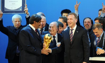 Sheikh Hamad bin Khalifa Al-Thani, Sepp Blatter and Russian Deputy Prime Minister Igor Shuvalov following the announcement that Russia and Qatar would host the 2018 and 2022 World Cups.