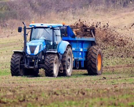 A farmer spreading fertiliser on a field in North Yorkshire