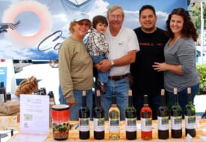 Steve Gliessman and his wife Robbie Jaffe, son Erin, his wife Oriana, and Mateo at the Westside farmers’ market in Santa Cruz.