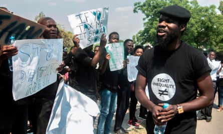 Pilato takes part in a protest against corruption in Lusaka in September class=