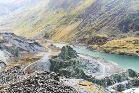 Dinorwic slate quarry in Welsh valley with a green lake