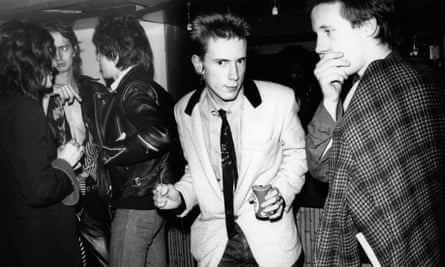 Nick Kent, second from left, in the Roxy Club with Johnny Rotten of the Sex Pistols.