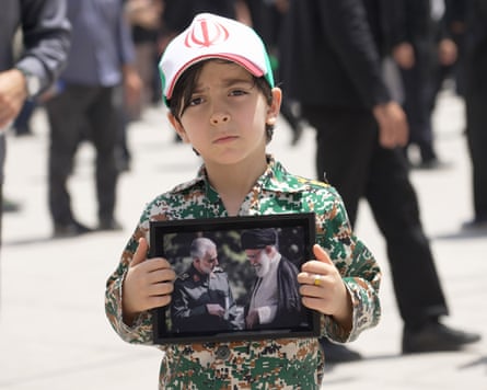 A child at Ali Khamenei’s funeral.