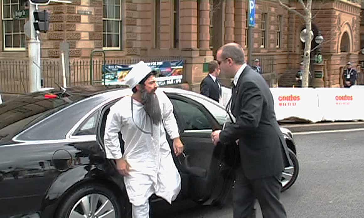 A screengrab supplied by ABC TV Tuesday, Sept. 11, 2007, of Julian Morrow (right) and Chas Licciardello (left) from the ABC TV show “The Chaser’s War On Everything” before being arrested after staging a fake motorcade through Sydney last Thursday, as part of an APEC week stunt.