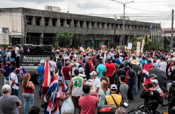 People take part in a protest in rejection of austerity policies promoted by the government to contain public spending amid the coronavirus pandemic, in front of the presidential house in San Jose, Costa Rica on 25 August 2020.