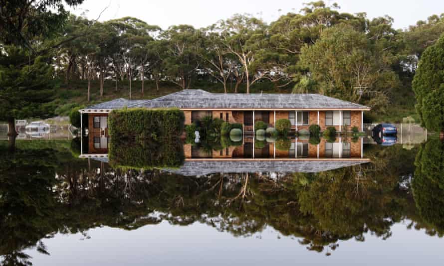 A house surrounded by flood water in Port Stephens, Australia
