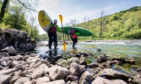 Kayakers on the River Wye in Herefordshire, where a drought has caused low water levels that threaten this year’s salmon run.