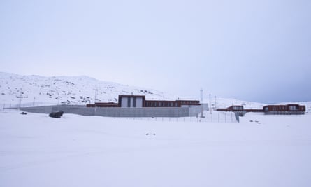 A building in an icy snowscape