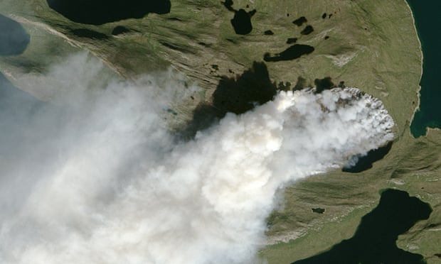 NASA Earth Observatory image by Jesse Allen, using Landsat data from the US Geological Survey, shows a wildfire in Greenland. 