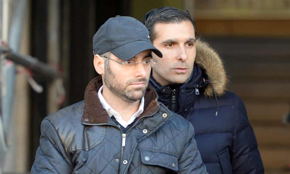Benjamin Amsellem (left), a Jewish teacher, leaves Marseille police headquarters