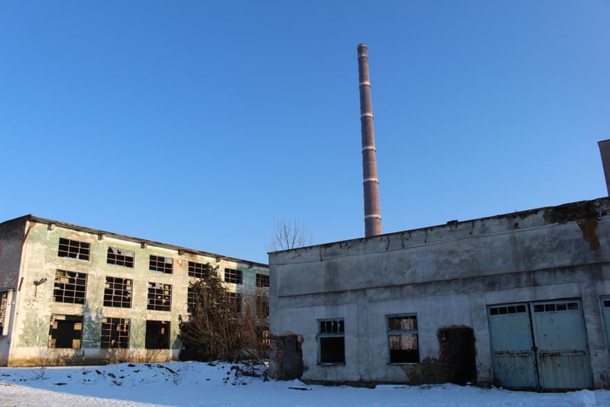 The smelting chimney looming over the Cuprom site in Baia Mare.