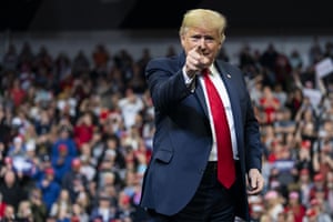 Donald Trump arrives to speak at a campaign rally in Iowa.