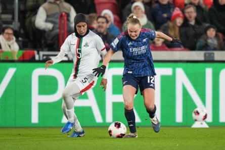 AS Far’s hijab-wearing Nouhaila Benzina tussles with Frida Maanum of Arsenal