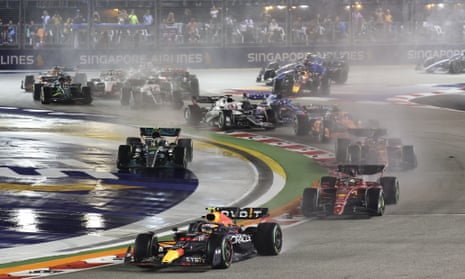 Red Bull’s Sergio Pérez leads the field soon after the start of the Singapore Grand Prix