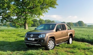 VW Amarok parked under a tree