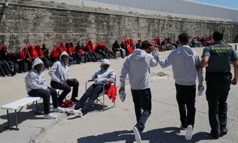 Migrants at the port of Tarifa after being taken from dinghies off the coast in the Strait of Gibraltar.