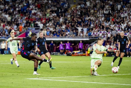 Michelle Agyemang (left) shoots and scores England’s equaliser during injury time.