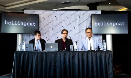 Eliot Higgins (centre) addresses a press conference about Malaysia Airlines flight MH17