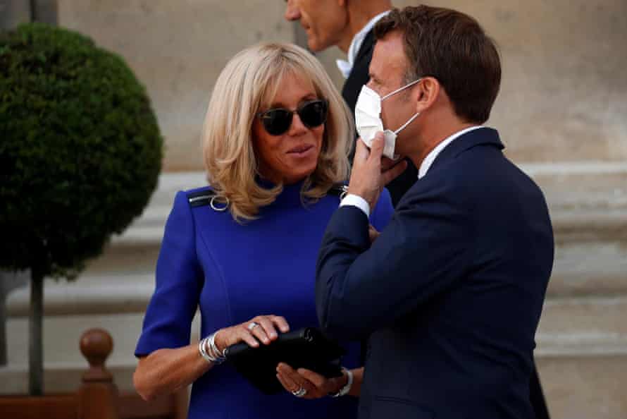 Emmanuel and Brigitte Macron … priorities.