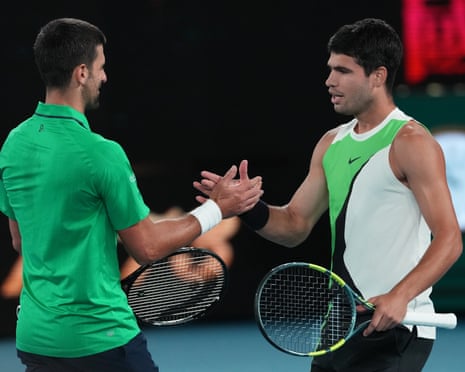 Carlos Alcaraz is congratulated by Novak Djokovic after winning the Australian Open final.