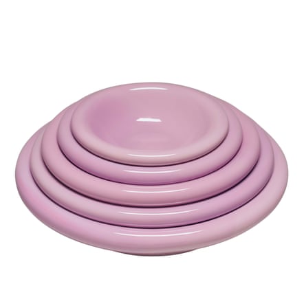 Stack of pink bowls with big curved edges