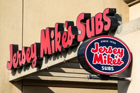 a sign with 'Jersey Mike's subs' in red