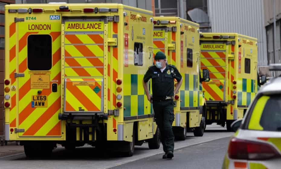 Ambulances stand outside the Royal London hospital