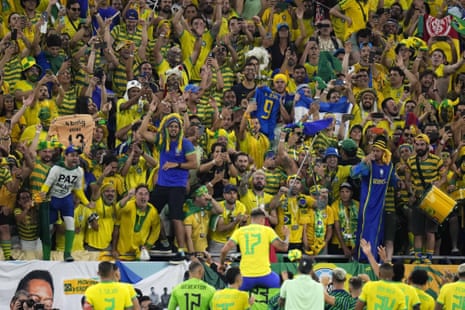 Fans of Brazil cheer their team after the World Cup round of 16 victory over South Korea.
